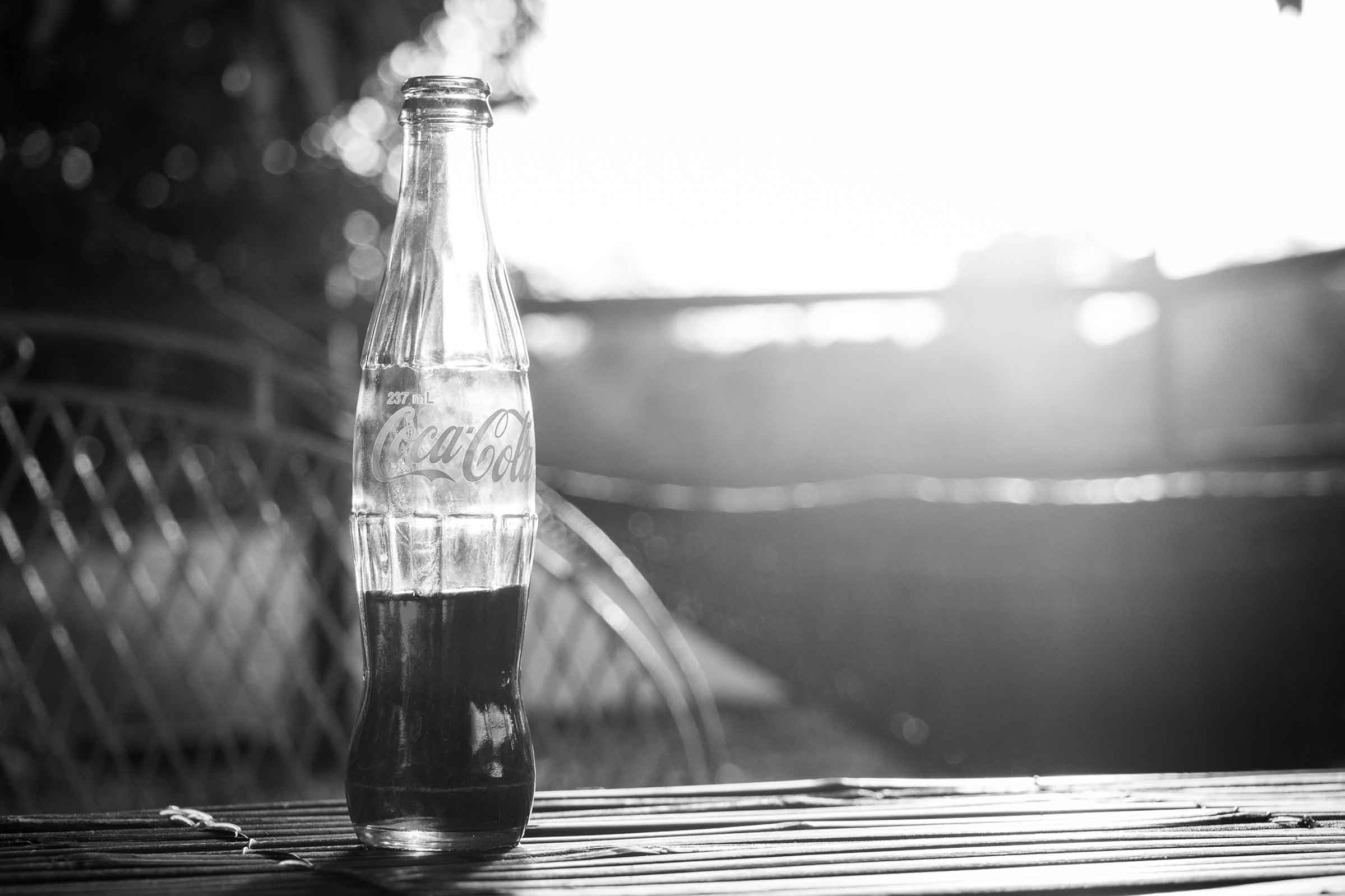 Photo of a Coca-cola bottle on a table